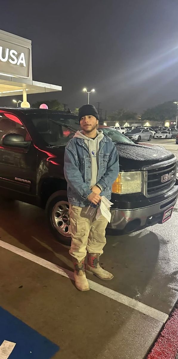 Customer with his black GMC truck