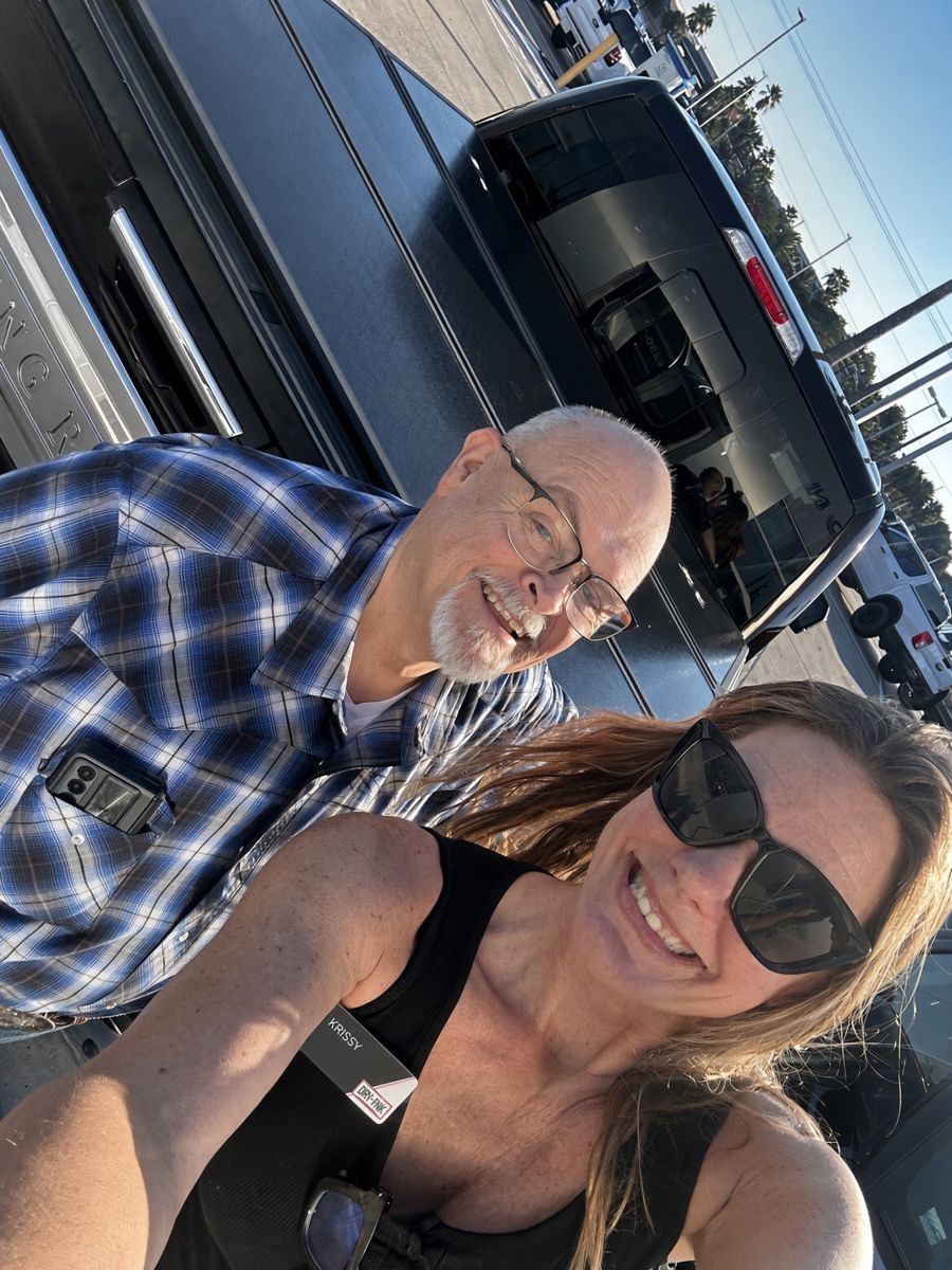Krissy with a customer by his truck