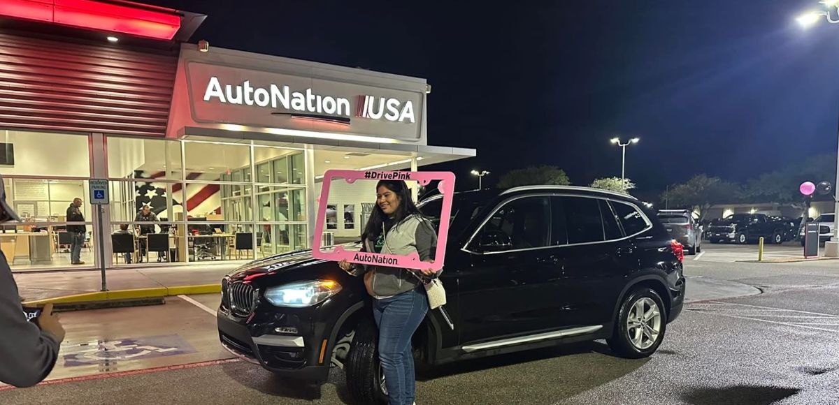 Customer with her first car, a BMW X3