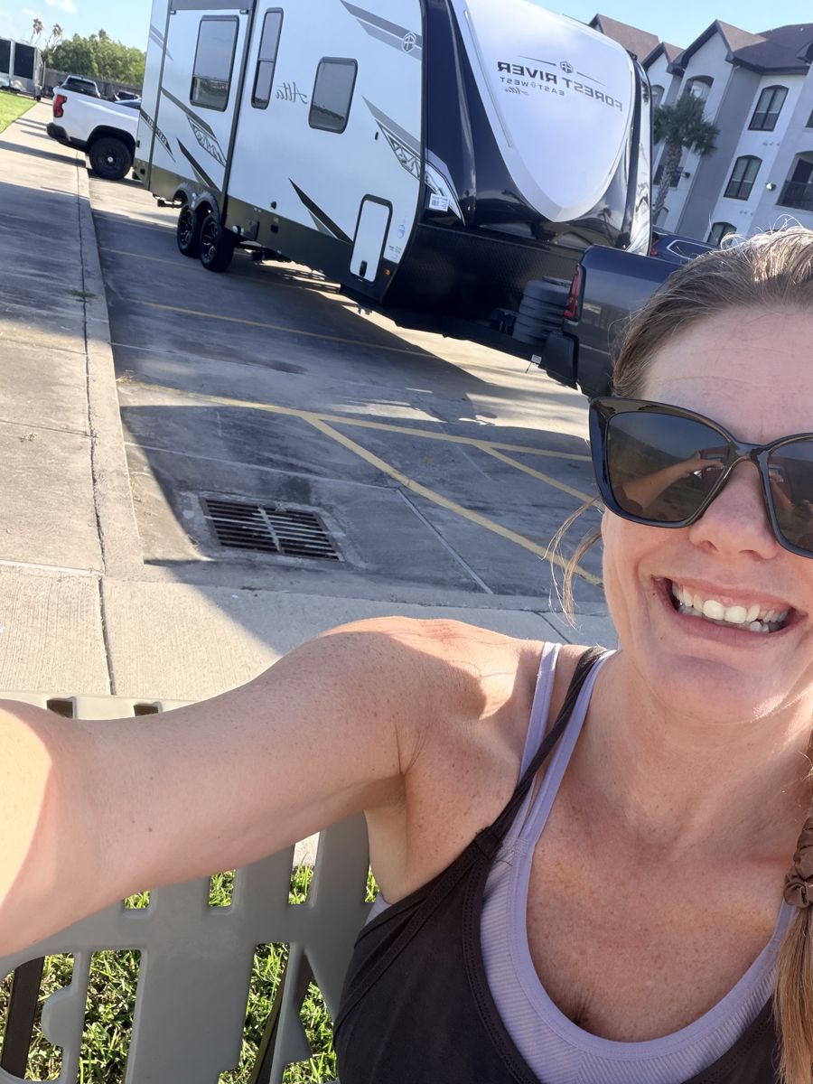 Krissy smiling outside her RV